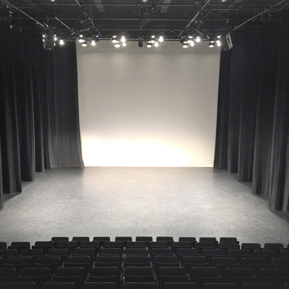 The seats and stage of the Faris Family Studio
