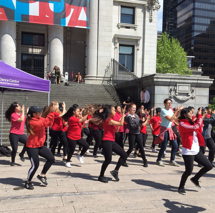 Students dance outside the Art Gallery on International Dance Day