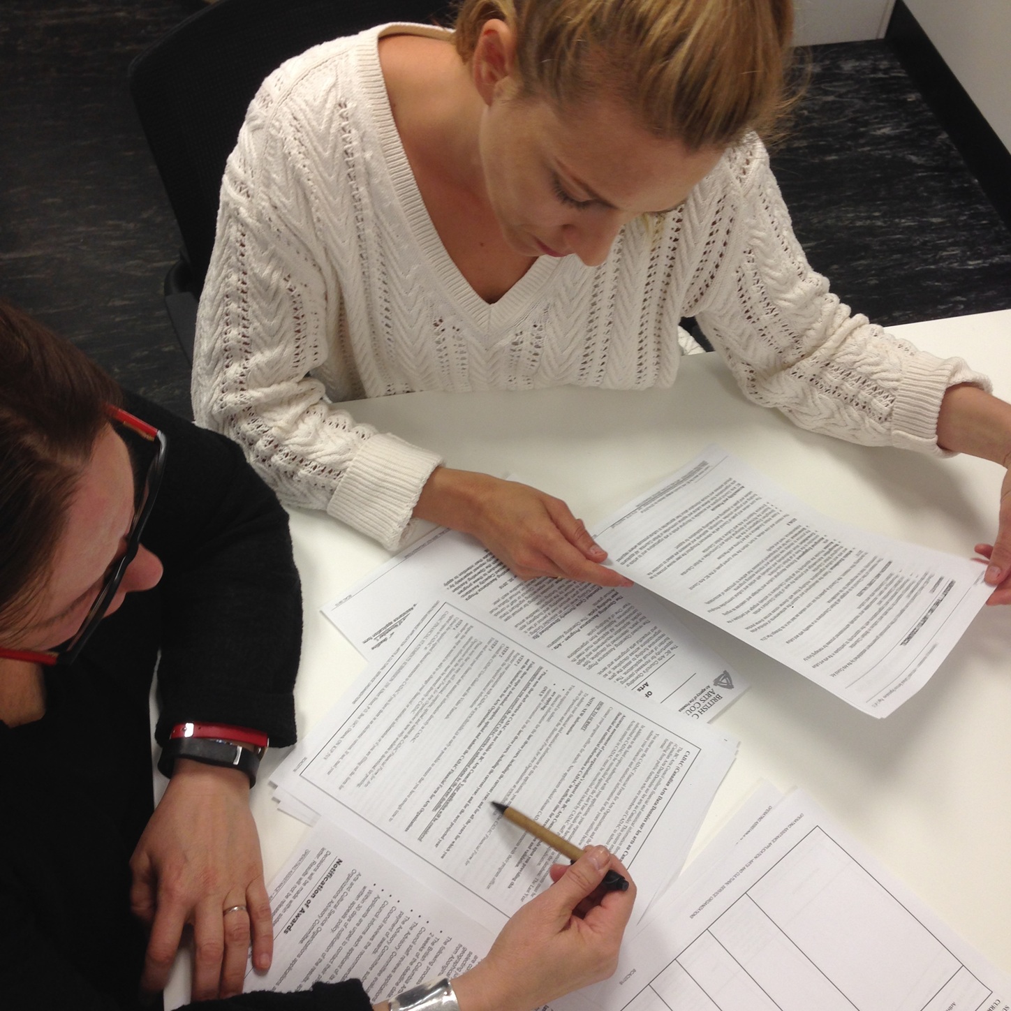 Dance Centre staff look over paperwork